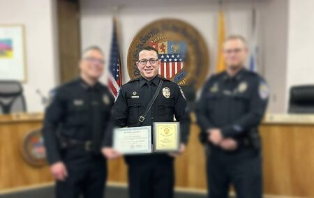 Santa Fe police officer charged with stalking, placed on leave