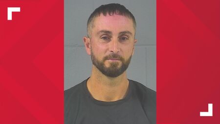 Former Lawrence police officer arrested for allegedly making threats to police officers